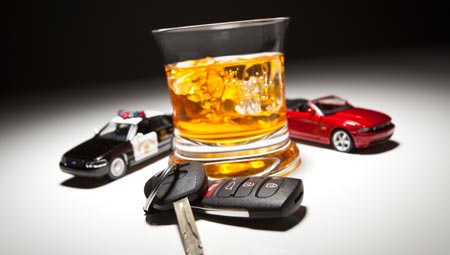 Drink, car keys, toy cars