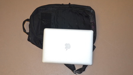 Photo of the MacBook Air in a black backpack